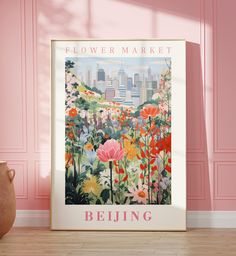 a flower market poster in front of a pink wall with a vase on the floor