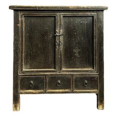 an old wooden cabinet with two doors and drawers