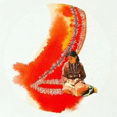 a woman sitting on the ground in front of an orange and red painting with words written across it