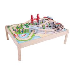 a wooden table with a toy train set on it