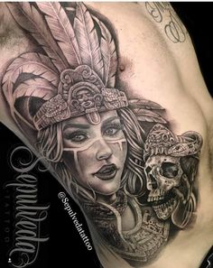 a woman with feathers on her head and skull in the other side of her stomach