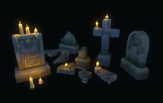 some candles and tombstones are lit up in the dark