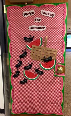 a bulletin board with watermelon slices on it and the words we're sorry for