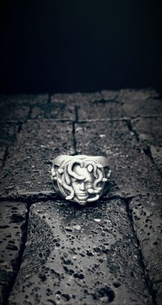 Ancient Medusa Silver Ring, Greek Mythology Medusa Ring, 925k Sterling Silver Jewelry, Strong Women Ring, Custom Gift Ideas for Men Women Item Details: Weight: 11-14 gr. Discover unique designs, handcrafted by 7S' s artisans. Artistic hands have added a special spirit to the details. You will find traditional and contemporary styles designed to delight those seeking something different. Handcrafted, Each Gold Plated and 925k Sterling Silver Ring is a unique piece that is professionally and individually created to give you and your loved one the best gift. **Custom Orders is Made** As 7S Atelier family, we will be happy to help you if you contact us with the photo and dimensions of the design you want. Thank you for shopping! Ready to Ship in 1-3 Business Days Shipped to the Worldwide with Madusa Ring, Sterling Silver Symbolic Snake Ring Collectible, Sterling Silver Snake Ring Collectible Symbolic, Collectible Symbolic Sterling Silver Snake Ring, Greek Rings, Greek Mythology Medusa, Mythology Medusa, Medusa Ring, Custom Gift Ideas