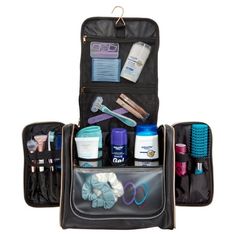 Keep your cosmetics organized and ready to go at a moment's notice with this Carryall Black Travel Toiletry Bag with Hanging Hook. This large, multi-pocketed travel organizer makes traveling easy. The large center compartment has zippered mesh compartments and a metal hanging hook for convenience, the left side zipper pocket features an elastic strap to keep bottles secure, and the right-side zippered pocket features a PVC separator. This large capacity bag can hold everything you need on a trip Cosmetic Train Case, Hanging Toiletry Bag, Travel Toiletry Bag, Makeup To Buy, Travel Organizer, Black Travel, Phnom Penh, Travel Toiletries, Toiletry Bag Travel