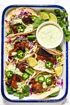 chicken fajitas with cilantro, jalapenos and guacamole