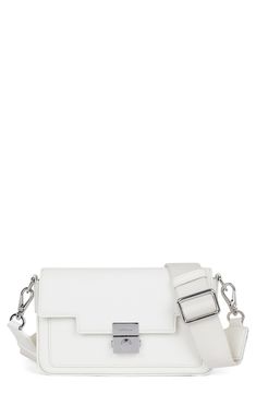 A structured silhouette defines this elevated everyday crossbody bag featuring a push-lock closure, an interior zip pocket and removable webbing strap. Structured silhouette with flat base for stability Lined Leather Imported Modern Evening Saddle Bag With Turn-lock Closure, Travel Clutch Shoulder Bag With Silver-tone Hardware, Modern Rectangular Flap Bag With Detachable Strap, Modern Belt Bag With Detachable Strap And Top Handle, Modern Belt Bag With Top Handle And Detachable Strap, Modern Business Bag With Turn-lock Closure, Modern Business Bags With Turn-lock Closure, Modern Flap Bag With Detachable Strap, Modern Crossbody Satchel