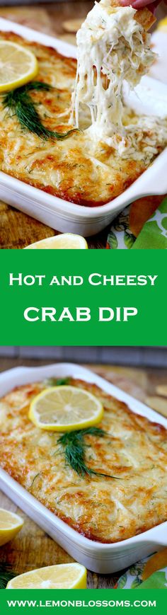 hot and cheesy crab dip with lemons on the side, served in a casserole dish