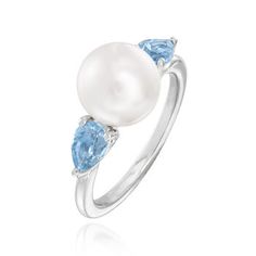 Gabriel Designs 9-9.5mm Cultured Pearl Ring, .98ct t. w. Swiss Blue Topaz. Size 6.5. From Gabriel Designs, this elegant pearl ring is elevated by vibrant gemstone color! .98 ct. t. w. pear-shaped Swiss blue topaz gems flank a gleaming 9-9.5mm cultured freshwater pearl for a very classic look in polished sterling silver. 3/8" wide. Gabriel Designs Swiss blue topaz and white pearl ring. Pearl birthstones are the perfect gift for June birthdays. Elegant Pear Shaped Topaz Ring, Elegant Pear-shaped Topaz Ring For Formal Events, Elegant Pear Shaped Topaz Ring For Formal Occasions, White Pearl Ring, Cultured Pearl Ring, Pearl Birthstone, Ring Pearl, Swiss Blue Topaz, Pearl Ring