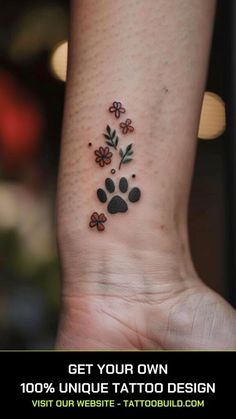 a person with a dog paw tattoo on their wrist and the words get your own 100 % unique tattoo design