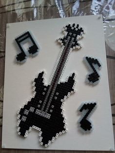 a piece of art made to look like a guitar