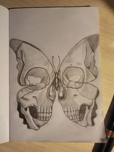 a pencil drawing of two skulls and a butterfly