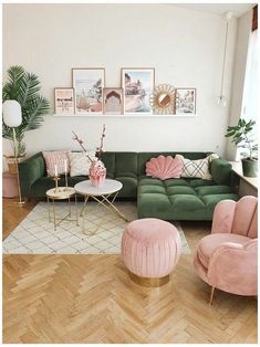 a living room filled with lots of furniture and pink velvet couches on top of hard wood flooring