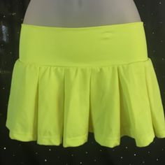 Lycra Pleated Mini Skirt With Velcro Enclosure. Minor Fabric Imperfections Shown In Photos. Brand New. I Am A Small And It Fits Me, But It Is Sold As One Size. Fitted Green Swim Skirt, Green Pleated Stretch Skort, Green Fitted Pleated Skirt For Summer, Fitted Green Pleated Skirt For Summer, Yellow Fitted Tennis Skirt For Summer, Yellow Pleated Party Bottoms, Summer Yellow Fitted Pleated Skirt, Casual Fitted Swim Skirt For Party, Fitted Casual Swim Skirt For Parties