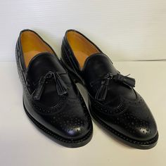 Allen Edmonds Manchester Men's Size 8b Black Calf Skin Tassel Wingtip Brogue Slip On Loafers. Made In Usa. New Without Tags Or Box, But Does Come With Dust Bags. Luxury Wingtip Tassel Loafers For Business, Luxury Moc Toe Tassel Loafers For Galas, Elegant Tassel Loafers With Rubber Sole And Cap Toe, Luxury Wingtip Tassel Loafers For Semi-formal Occasions, Black Wingtip Loafers For Galas, Black Tassel Loafers With Brogue Detailing, Black Wingtip Tassel Loafers With Rubber Sole, Wingtip Leather Shoes With Tassels, Formal Tassel Loafers With Brogue Detailing