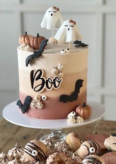 there is a cake decorated with halloween decorations