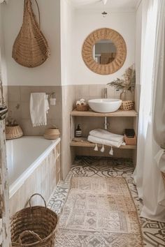 a bathroom with a tub, sink and mirror