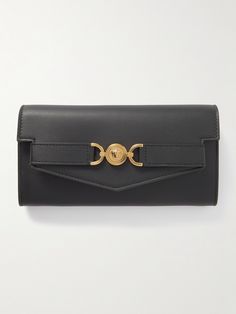 With its gold-tone 'Medusa' hardware, this 'Continental' wallet is unmistakably Versace. It’s been made in Italy from smooth leather and has plenty of space inside to keep all your cards organized. Tommy Hilfiger Bags, Eyewear Shop, Gucci Eyewear, Versace Wallet, Your Cards, Card Organizer, Small Purse, Sunglasses Shop, Hand Bags