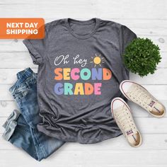 Oh Hey Second Grade Teacher Shirt, 2nd Grade Teacher Shirt, 2nd Grade TShirt, Second Grade Team T-Shirt, 2nd Grade Crew, 2nd Grade Squad Hi! Welcome to the TeeScape! It's great to see you here! Our shirts are clean, high quality and soft. It is prepared quickly by our store! Enjoy your shopping! It is a pleasure for us to help you with your questions and you can reach us at any time. F I T ∙ S I Z I N G -->Women's sizes are narrower than the waist -->Sleeves are rolled up in some product picture Hello 3rd Grade, 4th Grade Teacher, Third Grade Teacher Shirts, 3rd Grade Teacher, Third Grade Teacher, 2nd Grade Teacher, Teacher Team, Second Grade Teacher, Teacher Tees