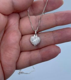 This beautiful heart charm necklace makes a perfect gift for that special person in your life and also a great gift for lovers of modern and minimalist jewelry. 💕 Approximately 1mm box chain (choice your length) Pendant  Height: 10.7mm Width: 11.8mm Thickness: 4.4mm Bail opening: 4mm Metal: 925 Sterling Silver ⭐️Free silver polishing cloth  ⭐️ It's completely natural for sterling silver to oxidize over time when it's exposed to air. Please, keep them in airtight plastic bag and use sterling silver polishing cloth to make them shine like new again. ⭐️ Each piece is packed in its own drawstring pouch and ordered is mailed out in bubble mailers to avoid any damages that can happen during transportation. Minimalist Heart Charm Jewelry For Anniversary, Minimalist Heart Charm Jewelry For Anniversary Gift, Minimalist Hypoallergenic Heart Pendant Jewelry, Adjustable Chain Heart Pendant Jewelry For Anniversary, Silver Heart Necklace With Box Chain Gift, Heart Pendant Jewelry With Adjustable Chain For Anniversary, Gift Heart Pendant Jewelry With Box Chain, Adjustable Heart Pendant Jewelry For Anniversary, Minimalist Heart Pendant Jewelry Gift