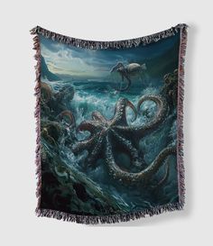 an octopus tapestry hanging on the wall in front of a gray background with water and waves