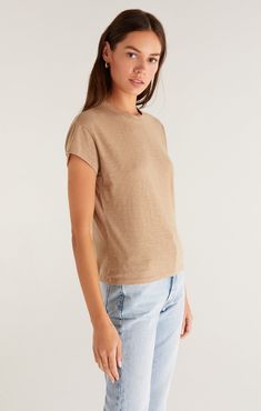 Your closet needs the Modern Slub Tee! This is a casual wardrobe base-layer essential made from our classic Cotton Slub Jersey fabric. This effortless top is meant to hit at the waistband of high rise styles and can be worn tucked or untucked. This tee is meant to fit closer on the body, so if you prefer a looser fit, we recommend sizing up. Z Supply Women's Modern Slub T-Shirt, Black, Extra Small, 100% Cotton Versatile Relaxed Fit T-shirt For Casual Gatherings, Relaxed Fit T-shirt For Casual Gatherings, Casual Soft-washed Short Sleeve Top For Everyday, Casual Soft-washed Short Sleeve Top, Summer Effortless Soft-washed T-shirt, Effortless Crew Neck T-shirt For Casual Gatherings, Trendy Crew Neck Short Sleeve Top For Casual Gatherings, Casual Crew Neck Short Sleeve Top, Casual Crew Neck Short Sleeve Top For Gatherings