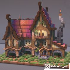 a very cute house made out of some sort of bricks and papercrafting materials