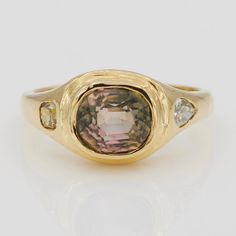 Neptune collection is finally here! This is a beautiful statement signet ring, set with a very special natural watermelon green & pink oval tourmaline in the center, natural color diamond on each side, handmade in 18k yellow gold. Details: -One of a Kind -18k yellow gold -natural watermelon green & pink oval tourmaline approx. 2.06ct -natural color diamonds approx. 0.40ct -handmade in NYC Oval Tourmaline Ring With Center Stone, Heirloom Oval Tourmaline Ring, Diamond Signet Ring, Gold Details, Signet Ring, Natural Color, Ring Set, Colored Diamonds, Tourmaline