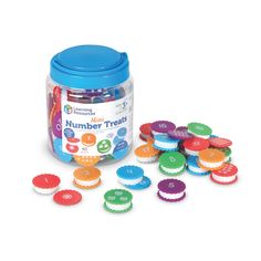 a jar filled with lots of different colored plastic buttons next to it's contents