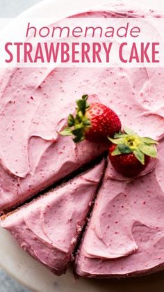 homemade strawberry cake on a white plate with strawberries