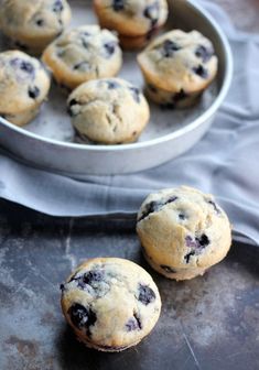 several blueberry muffins in a metal pan