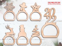 wooden cutouts with christmas decorations and snowflakes