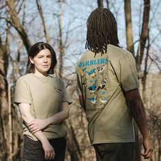 Get to know some of the colorful warblers of the Americas with this soft tee. These small and fast-moving songbirds hunt for insects in wooded, brushy, or swampy grassland habitats. Upland Bird Hunting Vest, Wildlife T Shirt Designs, Buffalo Wild Wings Shirt, Grassland Habitat, Mobile Stickers, Casual Summer T-shirt With Bird Print, Bird Mobile, Fast Moving, Bird Shirt