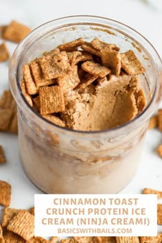 cinnamon toast crunch protein ice cream in a glass jar with graham crackers on the side