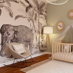 a baby's room decorated in neutral colors with an elephant mural on the wall