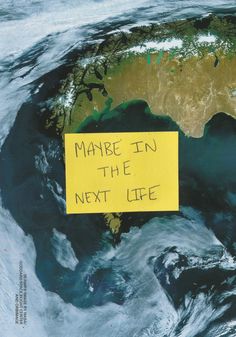 a yellow sign that says make in the next life on top of an earth globe