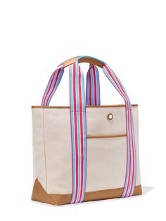 The Large Cabana Tote, perfectly oversized for beach and work trips, as an overnight bag, or as a companion for any journey, is a best seller that's sold out seven times and has a solid five-star ranking. It fits everything, it’s vibrant and stylish with its colorful stripes, and it’s sustainably crafted from our durable, spill-proof EcoCraft Canvas®, made from recycled plastic bottles. Make it yours by adding your initials below. Travel Size Shampoo, Checked Luggage, Travel Tote Bag, Fits Clothes, Beach Trips, Vanity Case, Everyday Tote, Bag Ideas, Travel Tote