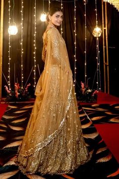 Dark gold lehenga with geometric sequin and cutdana embroidery. Paired with full sleeve embroidered blouse and dupatta. - Aza Fashions Gold Floor-length Anarkali Set With Sheer Dupatta, Floor-length Sheer Gold Dupatta, Gold Anarkali Style Pre-draped Saree For Wedding, Gold Anarkali Set With Sheer Dupatta For Reception, Designer Gold Gown With Sheer Dupatta, Gold Pre-draped Saree For Wedding And Navratri, Gold Lehenga With Mirror Work Floor-length, Anarkali Gold Gown With Sheer Dupatta, Navratri Gold Mirror Work Dress