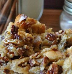 a pile of pecan bread sitting on top of a white plate