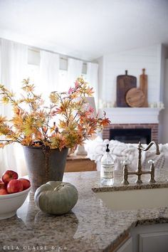 the kitchen counter is clean and ready to be used as a centerpiece for fall decor