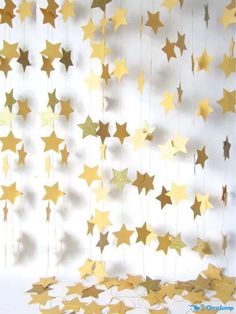 some gold stars hanging from the ceiling