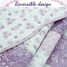 an image of a quilt with the words reversible design on it