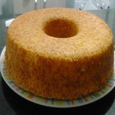 a round cake sitting on top of a white plate