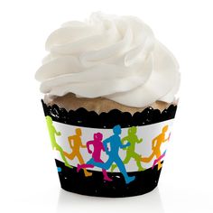 a cupcake with white frosting and running silhouettes on the wrapper is shown