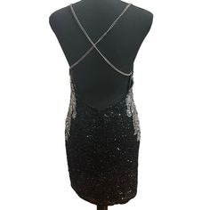 Nwt Enchanted Black & Silver Sequin/Beaded Adjustable Chain Straps Backless Short Dress Size 6. Price Tag Is Gone But Extra Sequins Are Still Attached (See Pictures) Never Worn. The Straps In The Back Can Be Adjusted. There Is A Zipper In The Back Of The Skirt Area Glamorous Mini Dress With Beaded Straps For Night Out, Glamorous Sequin Dress With Beaded Straps For Night Out, Evening Sequin Mini Dress With Beaded Straps, Evening Mini Sequin Dress With Beaded Straps, Glamorous Mini Dress With Beaded Straps For Evening, Glamorous Evening Mini Dress With Beaded Straps, Elegant Sequin Dress With Beaded Straps For Night Out, Glamorous Gala Dresses With Chain Strap, Beaded Straps Backless Mini Dress For Night Out