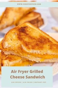 a grilled cheese sandwich on a white plate with the words air fryer grilled cheese sandwich