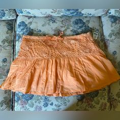 Summer Holiday Orange Macrame Skirt With Ties In The Front And Crochet/Macram Like Detailing As Pictured I Envision This Is Bali Re Thrift : Love It Just Is Too Small For Me 100% Cotton And Made In India. Wet Seal Color Is A Little Different In Person But For Some Reason The Picture Shows A Slightly Size: 5 Summer Cotton Mini Skirt For Vacation, Cotton Mini Skirt For Summer Vacation, Cotton Mini Skirt For Vacation, Bohemian Short Mini Skirt For Spring, Beach Cotton Skort Mini Length, Cotton Mini Skirt For Beach, Summer Cotton Mini Skirt For Beach, Orange Mini Skirt For Beach In Summer, Summer Cotton Skirt For Beach Season