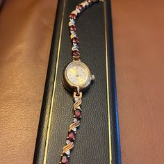 Vintage, Still In Original Box. Genuine Garnet Timepiece In 14kt Plated Gold. Pristine Condition. Stainless Back, Needs Battery. Protective Film Still On Face. Measures 8“ Maximalist Jewelry, Cheetah Print Scarf, Diesel Watch, Gold Plated Watch, Vintage Watches Women, Retro Watches, Funky Jewelry, Perfume Collection, Vintage Crystal