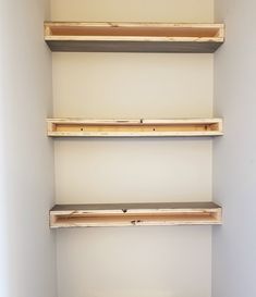 empty shelves in the corner of a room