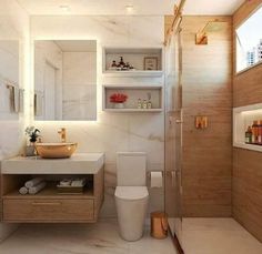 a bathroom with a toilet, sink and shower stall in the middle of the room